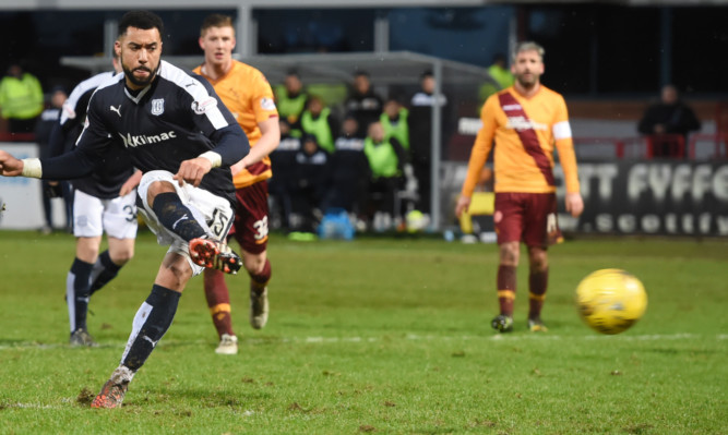 Kane Hemmings equalises from the spot for Dundee.