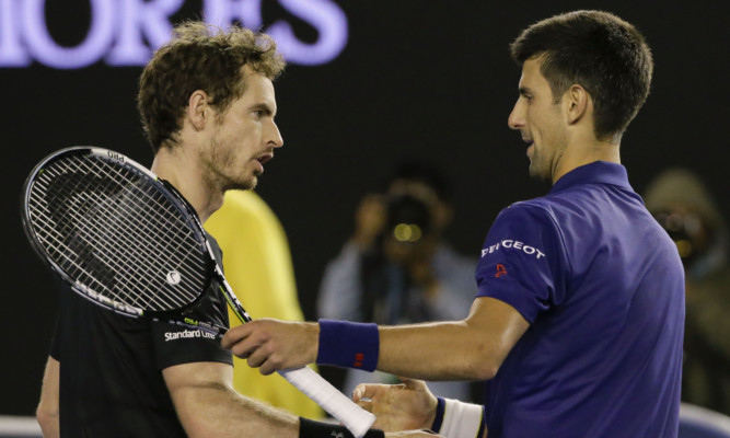 Novak Djokovic is congratulated by Andy Murray.