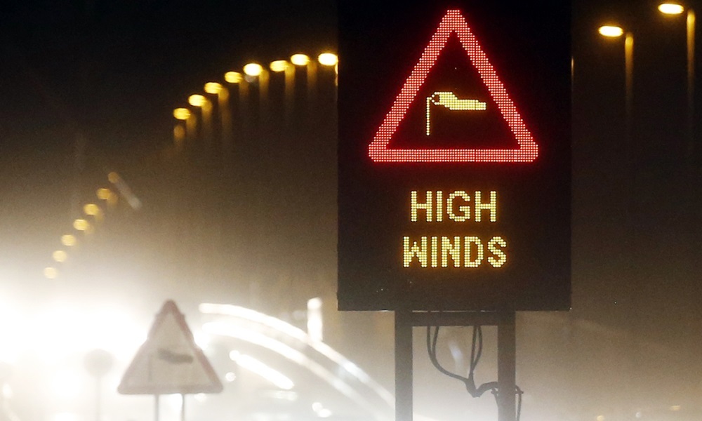 A High wind warning on the Forth Road Bridge near Edinburgh, Scotland as heavy rain and high winds continue.