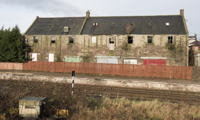 The derelict builders yard in Brechins Park Road earmarked for the housing development.