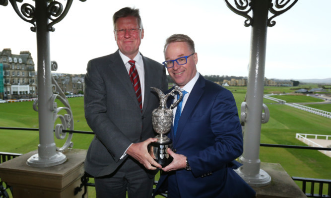 Martin Slumbers, Chief Executive of the R&A with European Tour CEO Keith Pelley and the Senior Open Championship Trophy.