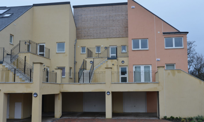 The blocks of flats on Kinnessburn Road.