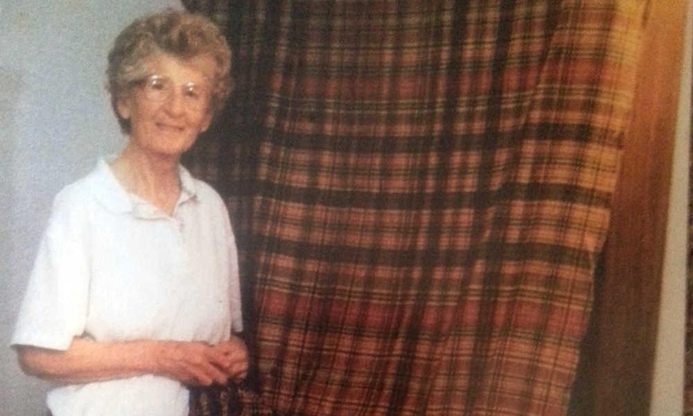 Robyn MacIntosh-Handtschoewercker, whose family lent some valuable tartan dating from the time of the battle of Culloden to Lord and Lady Airlie. Family lore has it ancestor John Ogilvy was a supporter of Bonnie Prince Charlie and wore the plaid prior to the famous battle and the defeat of Charlie’s Jacobite army. 

pictured here Robyn MacIntosh-Handtschoewercker's late aunt Alice, who bequethed the cloth to her. Aunt Alice died in 2011.