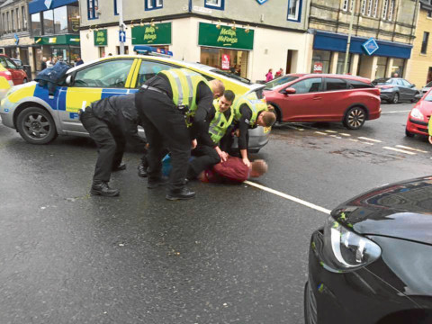 A man is detained by police in Broughty Ferry following the incident.