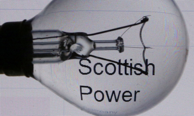 General view of a light bulb by the logo of power company ScottishPower. The energy giant is to pay £8.5 million to customers after an investigation by regulator Ofgem found that the group provided misleading information through its doorstep and telesales agents. PRESS ASSOCIATION Photo. Picture date: Tuesday October 22, 2013. The watchdog said that, between October 2009 and January 2012, ScottishPower provided customers with inaccurate estimations of annual charges and comparisons with their current supplier if they switched to the firm and failed to adequately monitor its sales staff. See PA story CITY ScottishPower. Photo credit should read: David Cheskin/PA Wire