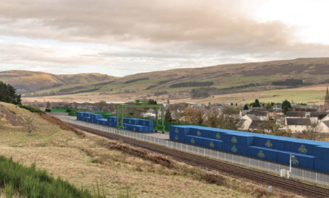 An artist's impression of the Highland Spring rail yard stacked with containers.