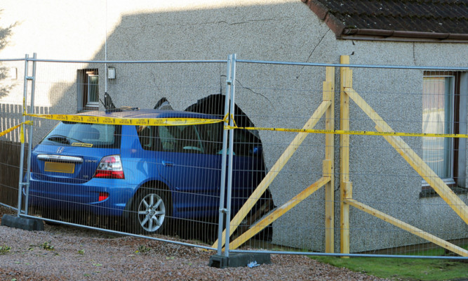 The car crashed through the gable end wall of the house in St Michaels Drive.