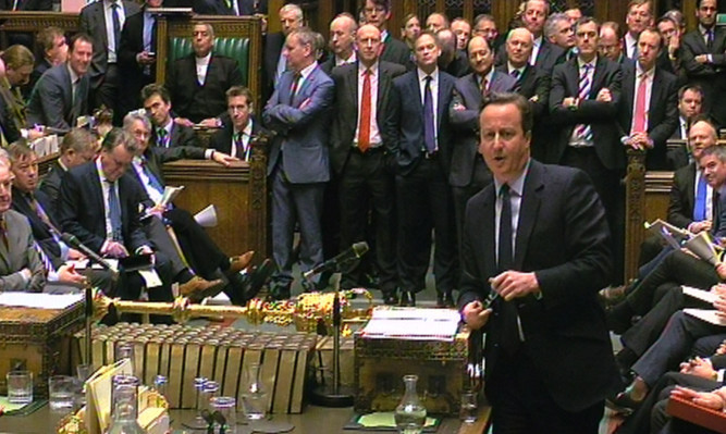 David Cameron speaks during Prime Minister's Questions in the House of Commons.