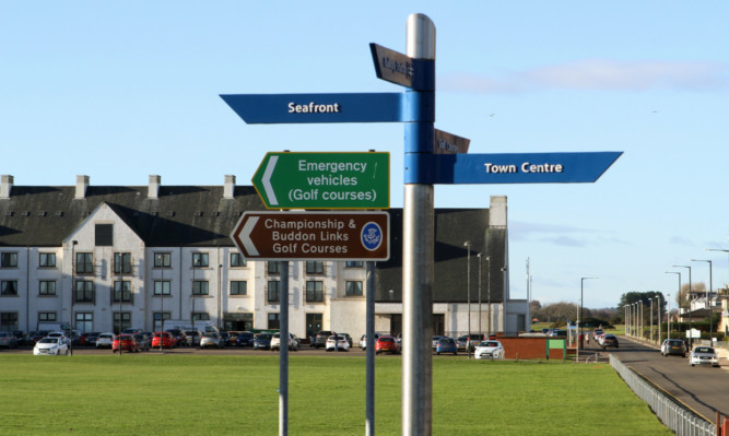 Some of the busy signposts in Carnoustie.