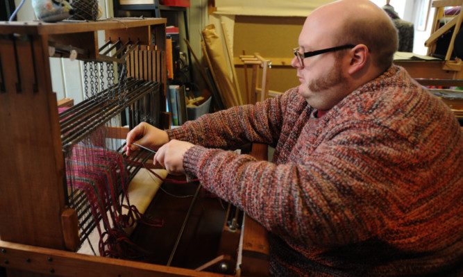 Ashleigh Slater, a Duncan of Jordanstone graduate who started weaving as a hobby and has now made a business from it.