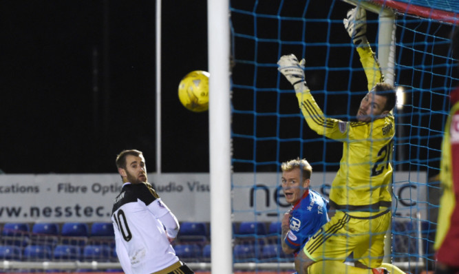 Carl Tremarcos header beats Dons keeper Scott Brown to make it 3-1 for Inverness.