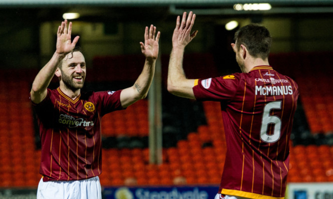 James McFadden (left) and Stephen McManus celebrate Motherwell's opening goal.