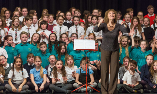 Fife primary pupils enjoy Sing Across Fife in the Lochgelly Centre.