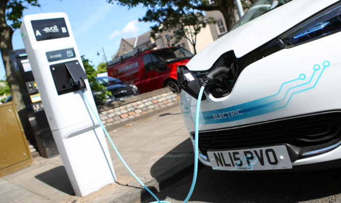 The council is accused of hogging the city's limited number of on-street charging points.