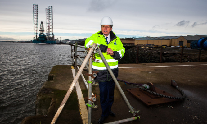 Charles Hammond, chief executive of Forth Ports, which has announced a major investment in Dundees Port. He, along with Jenny, is calling for the Scottish Government to get more involved in securing jobs in the city.