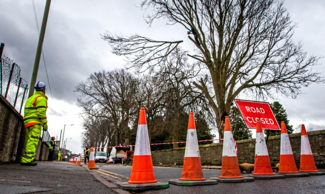 Feus Road is closed between junctions with Church Street and Longcauseway due to the dangerous tree.