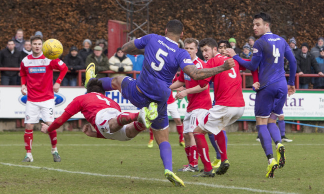 A challenge in the box during Saturday's game.