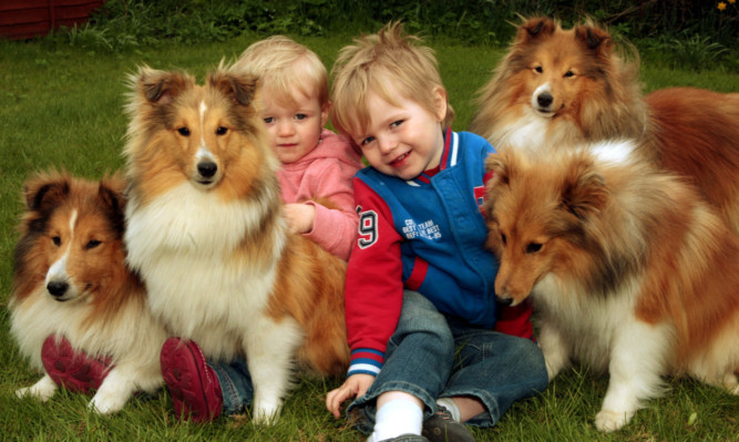 Chantelle and Jayden Forbes are seen with some of Annah's family members (from left) Blaze,Poppy, Oliver and Austin.