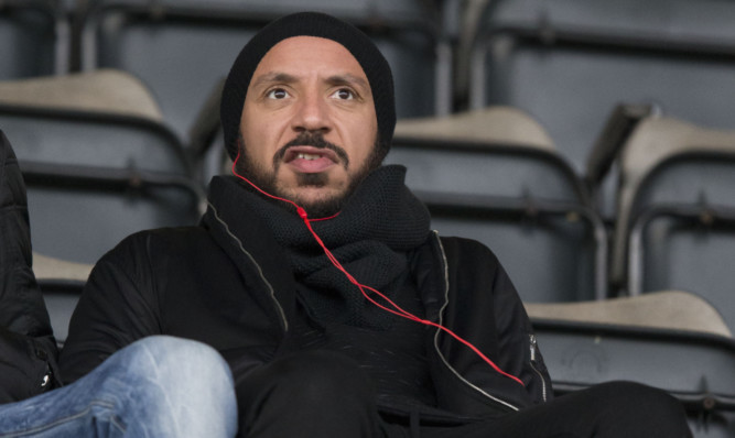 Julien Faubert watching Saints play Motherwell.