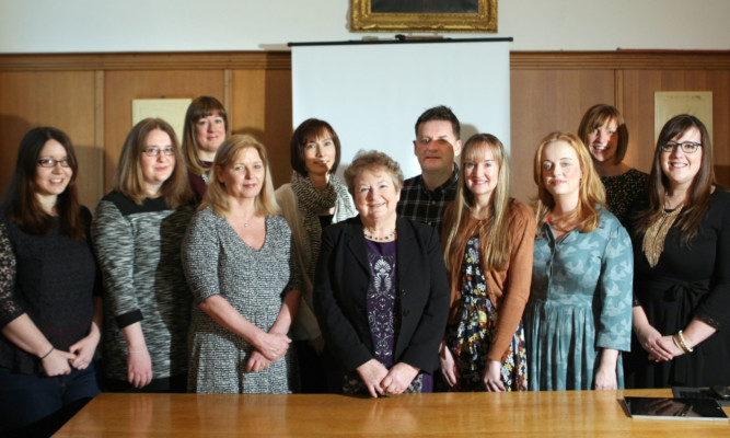 Councillor Sheena Welsh, convener for children and learning, with the new group of students.