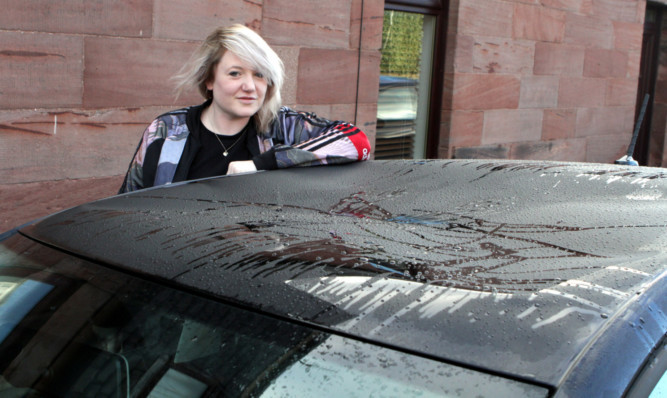 Layla Brown returned to her car to find vandals had jumped on the roof causing around £3,000 worth of damage.