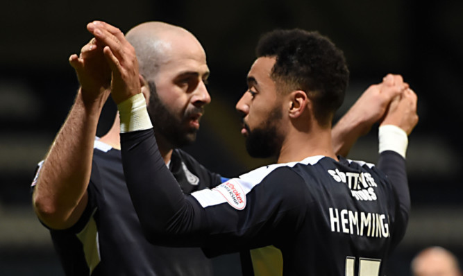 Kane Hemmings (right) celebrates his goal against Dumbarton on Tuesday night with Gary Harkins.