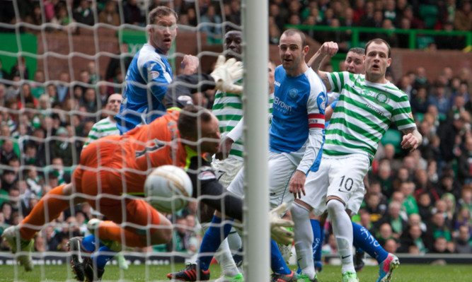 Anthony Stokes (right) watches as the ball heads into the net for Celtic's second goal.