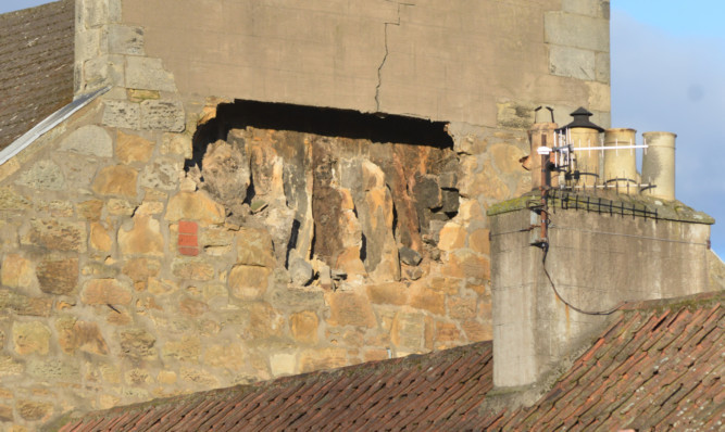 The gaping hole in the side of the building after part of the chimney breast collapsed.