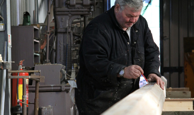 Richard Kelly working on the aft mast.