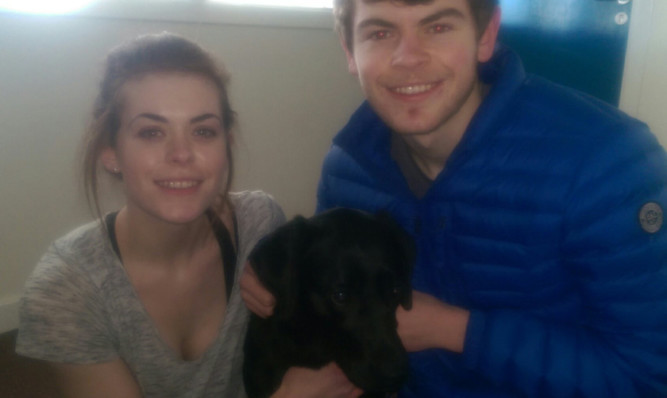 Katharine and James with Yancy during the visit to the Forfar Guide Dogs Centre.