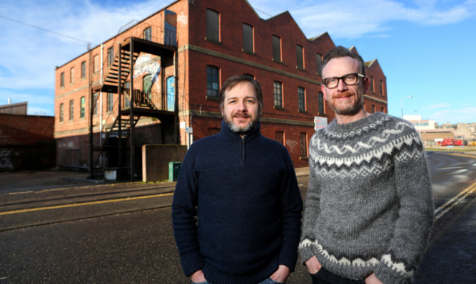 Mark Griffiths and Duncan Alexander outside the new brewery on Bellfield Street.