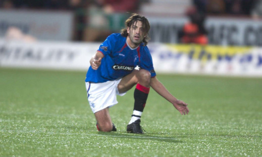 Rangers' Nuno Capucho remonstrating against Dunfermline's plastic pitch in 2003. Jim says synthetic surfaces have come a long way since then.