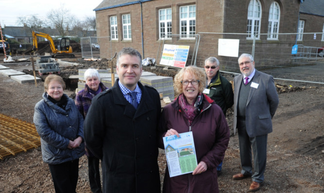 At the former Eastgate School are, from left: councillors Sheena Welsh, Janette Gaul and Donald Morrison, Ms Burgess, property director Paul Hartley and Dougie Pond.