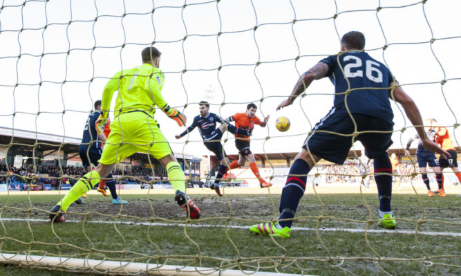 Paul Paton (centre) opens the scoring.