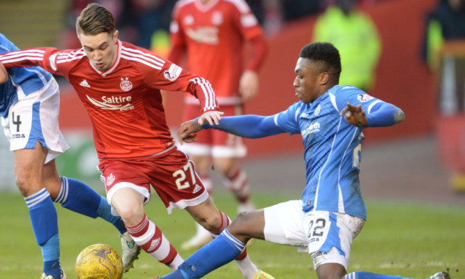 Darnell Fisher in action against Aberdeen.