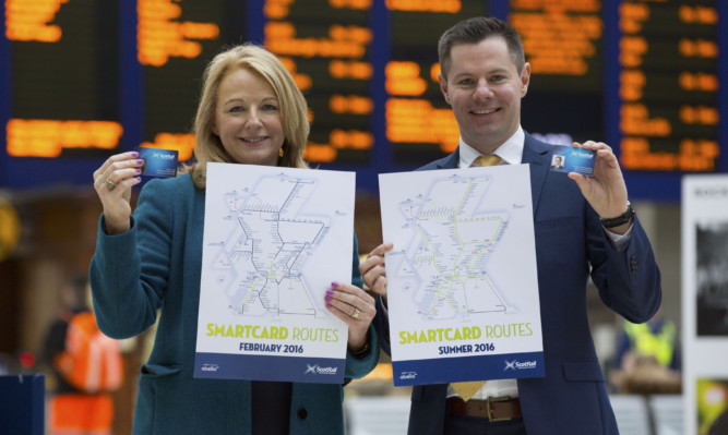 From left: 
Scotrail Alliance Commercial Director Cathy Craig and Transport Minister Derek Mackay join to launch the 'Summer of Smart'.