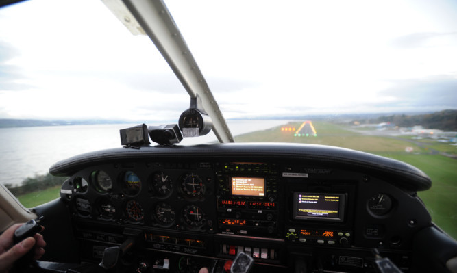 The laser was shone into the cockpit of the plane as it was landing at Dundee Airport.