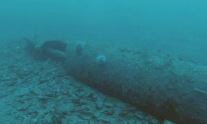 A 23 feet German torpedo discovered in the Scapa Flow is thought to have been used in one of Britain's most infamous naval disasters.