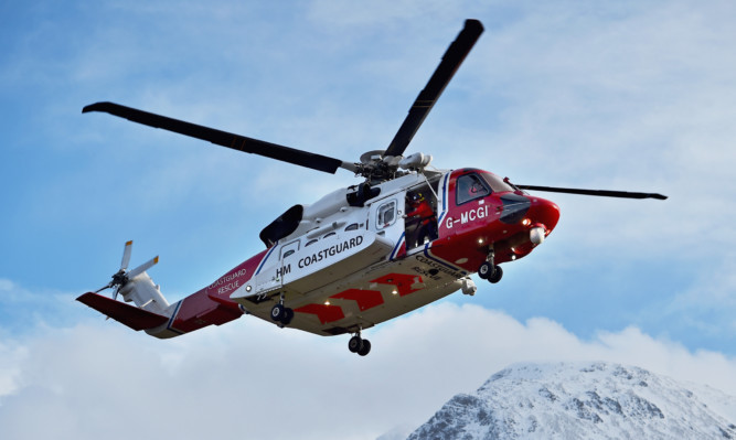 A Coastguard helicopter helped with the rescue operation.