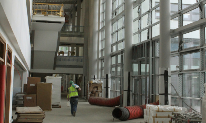 Glass and light dominate in the main halls.