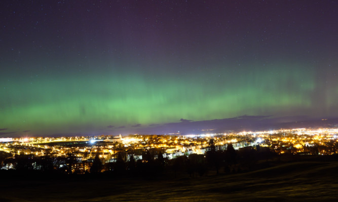 Stuart Cowper sent in this photo of the lights over Perth.