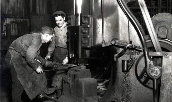 Men at work in the engineering shop at Burntisland Shipyard.