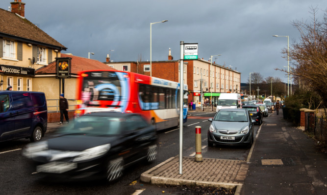 The woman was attacked on Rannoch Road in the Letham area of Perth.