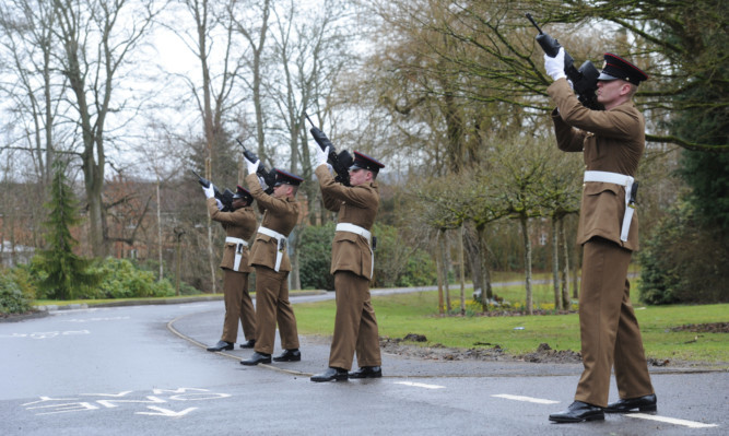 Peter Cluff was honoured with a full gun salute as he was laid to rest at Perth Crematorium.