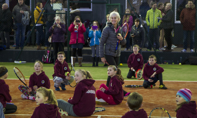 Judy Murray carries out a coaching session at the opening of the new all-weather courts.