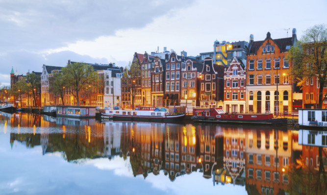 Flybe will begin direct scheduled flights between Dundee and Amsterdam in May.