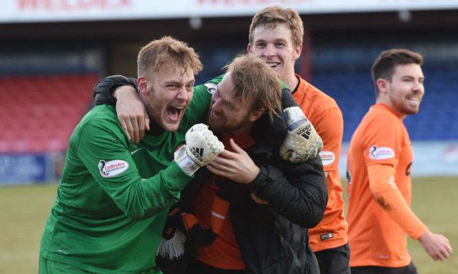 Smiling Dundee United faces have been as elusive as the Northern Lights for most of this season.