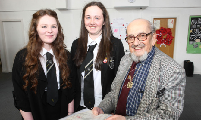 Harry Bibring with pupils Bethany White and Ellie Younger.