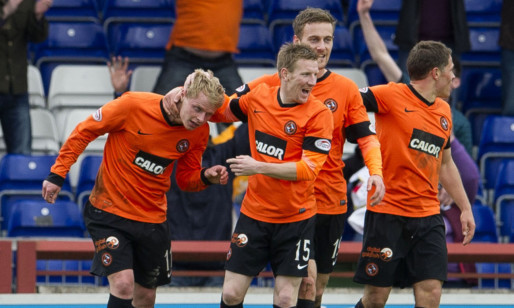 Gary Mackay-Steven (left) is hailed on his last minute winner for Dundee Utd.