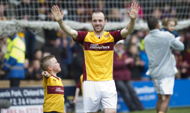 Motherwell's James McFadden salutes the fans at full-time.